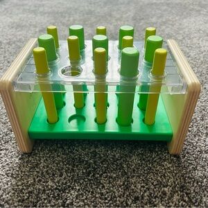 Vibrant Green and Yellow Peg Toy for Kids